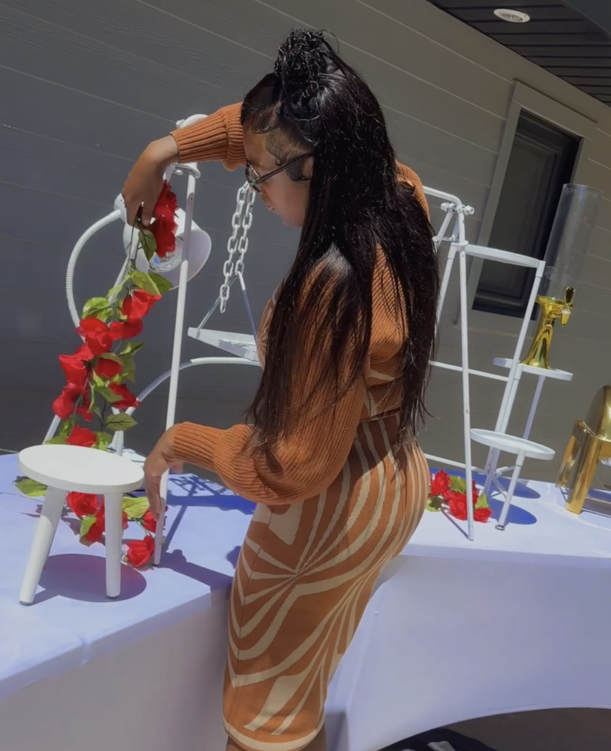 Chef Nesha styling an elegant outdoor catering setup